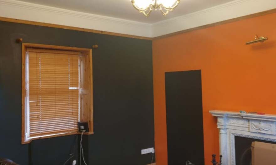 An image of a room before we painted it